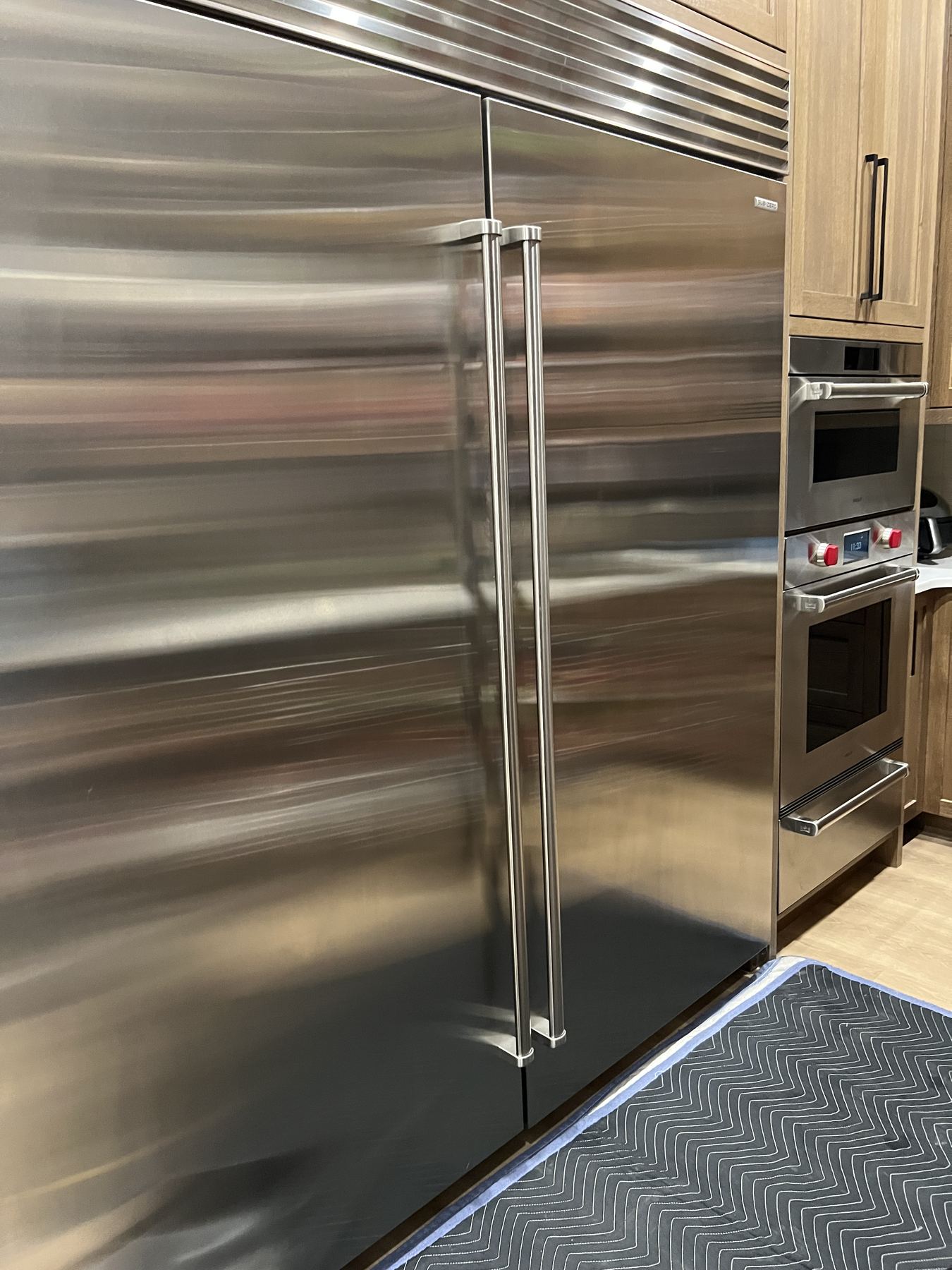 Stainless Sub-Zero and Wolf appliances in a client kitchen