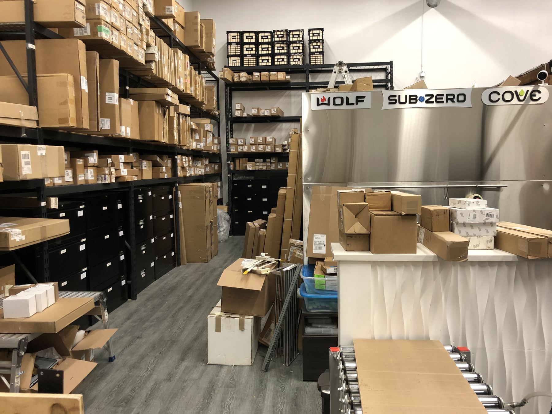 Shelves of boxed Sub-Zero, Wolf and Cove parts at the Vantage service centre